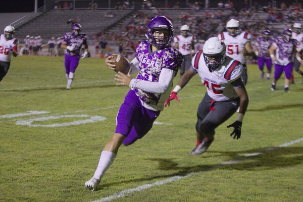 Lemoore quarterback Justin Holaday scored his team's only touchdown, a 9-yard-run, in the third quarter.